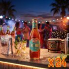 Kinnie Rumba Flasche 250 ml als 24er-Pack, im Hintergrund eine Strandbar auf Malta